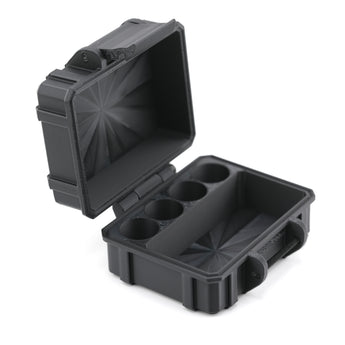 Black plastic case with compartments on a white background