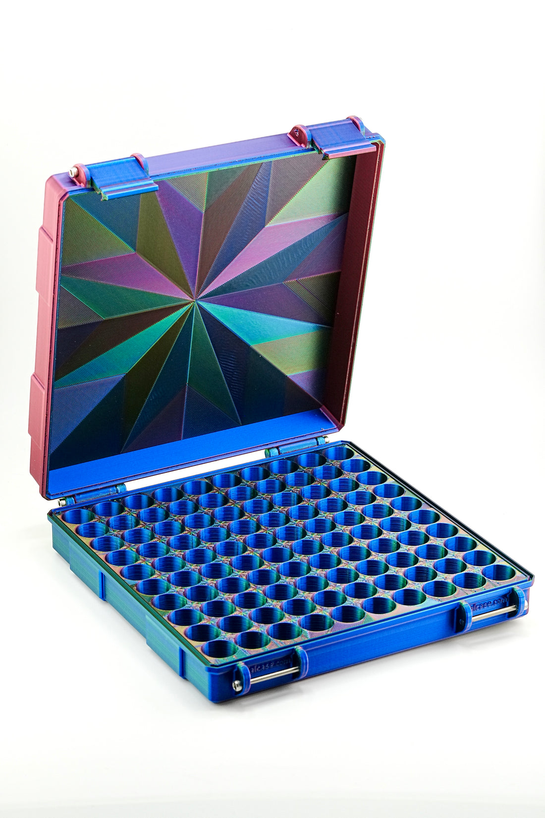 Colorful geometric-patterned case with blue interior on a white background