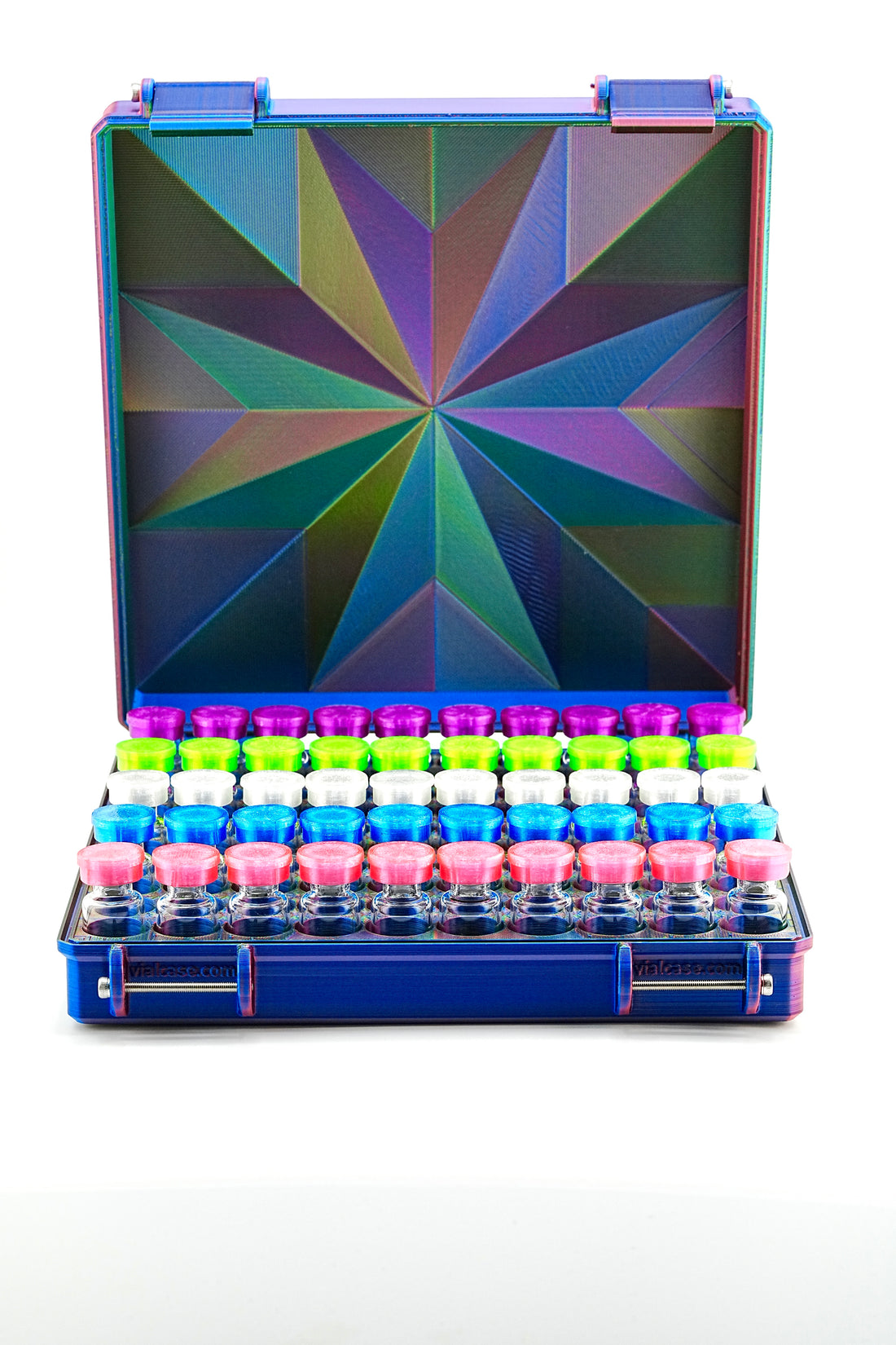 Colorful sample vials in a blue case with geometric design