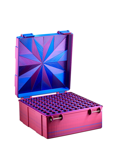 Colorful metallic vial box with geometric design on a white background