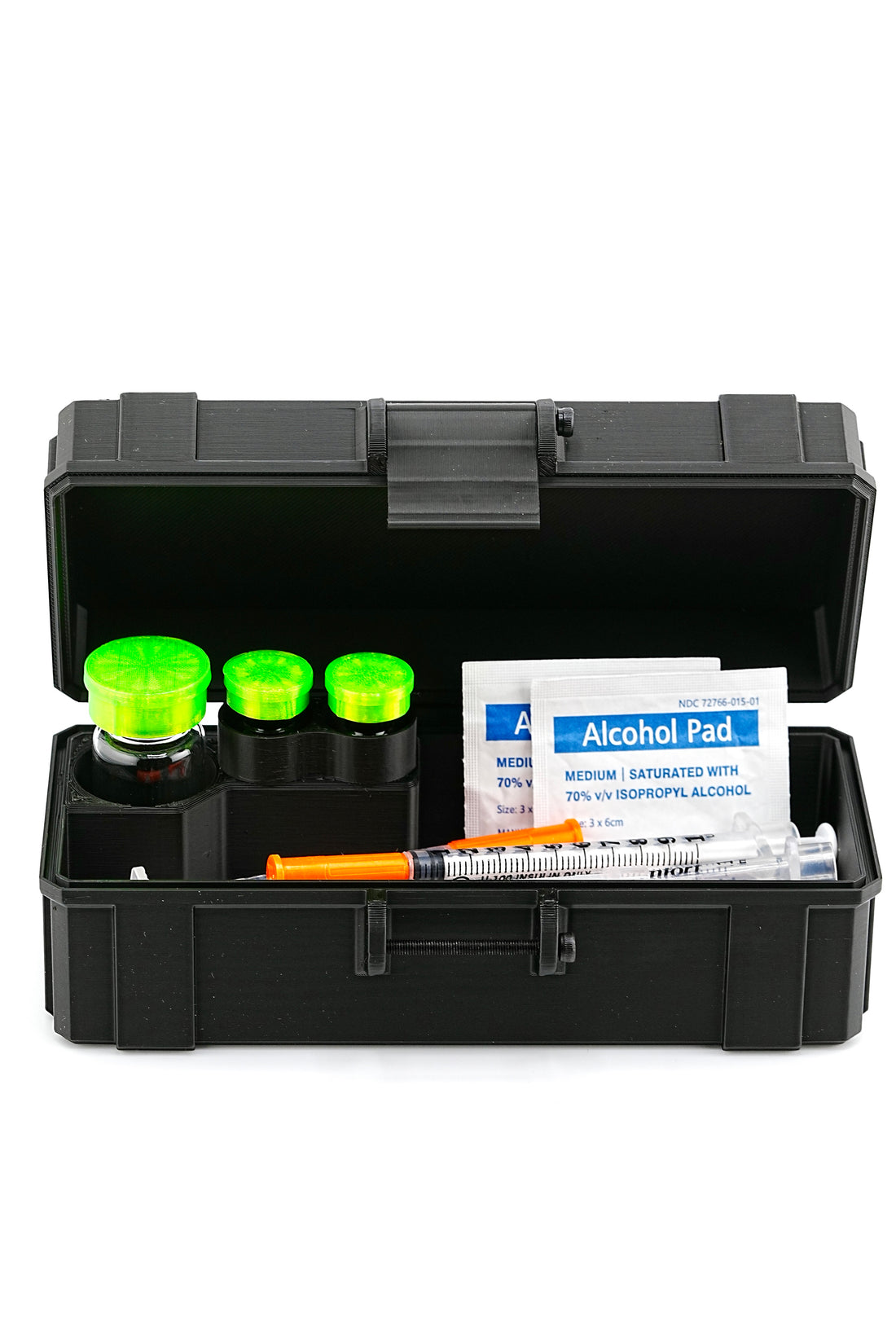 Black travel case with green caps, syringe, alcohol pad, and cotton swabs on a white background