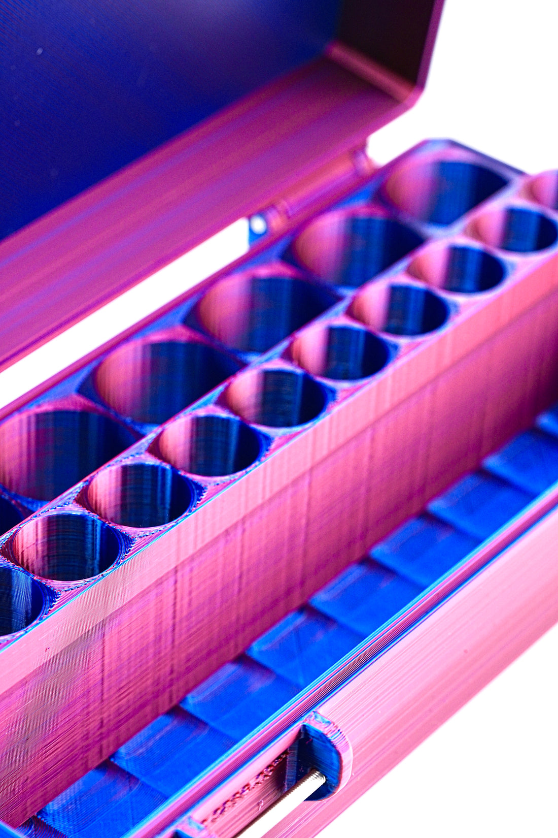 Close-up view of mixed vial case interior showing individual vial slots