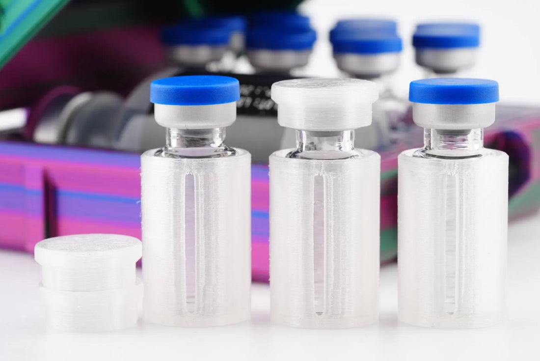 Vial Protection Kit vial cap set, opened to reveal interior storage slots