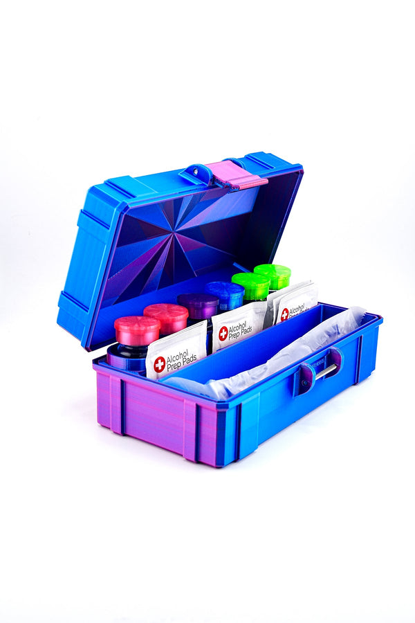 VialCase 6-Slot 10ml case with syringe and prep pad storage next to a desktop centrifuge