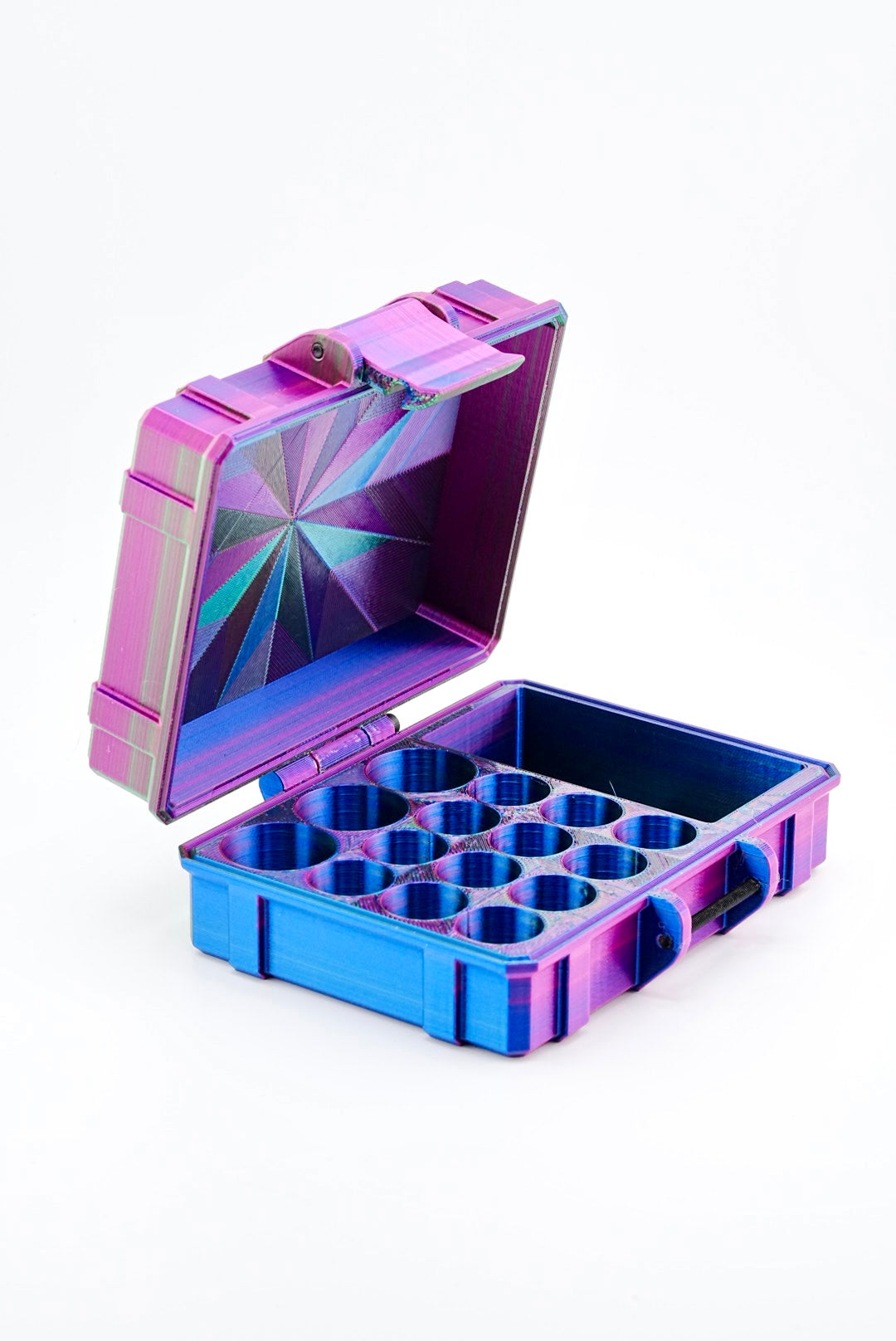 Multicolored metallic case with a compartmentalized interior on a white background