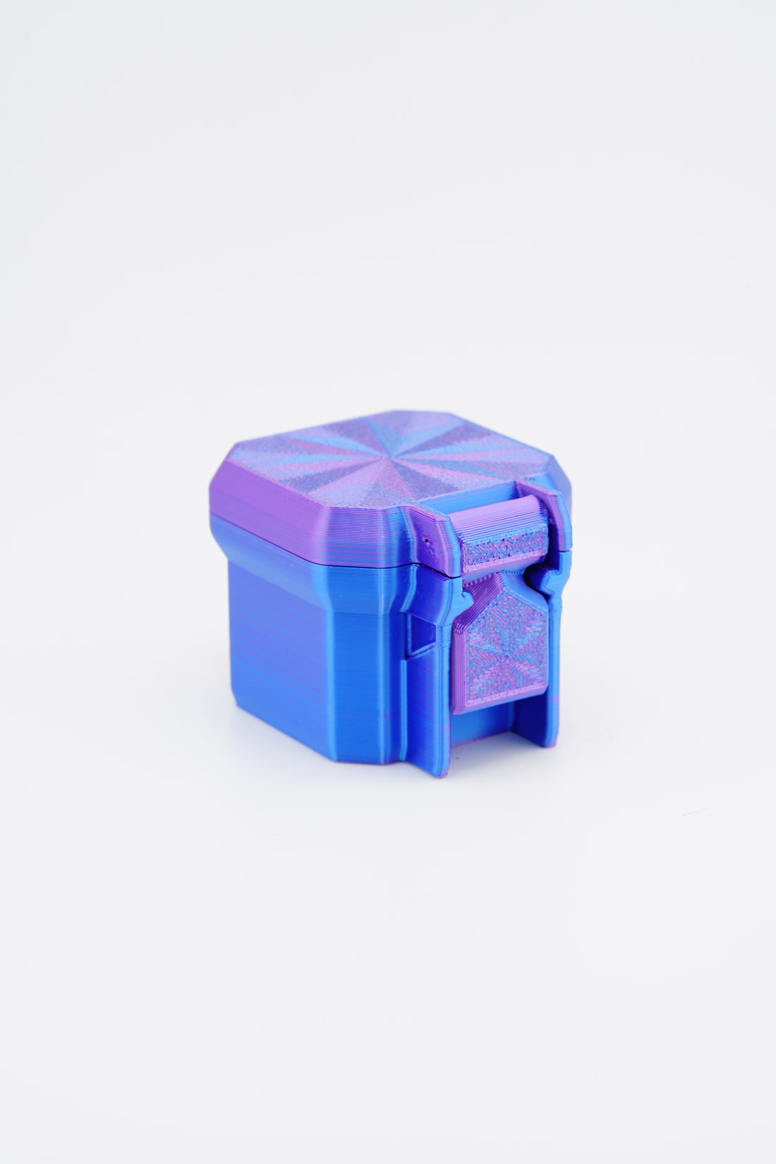 Blue and purple hexagonal container on a white background
