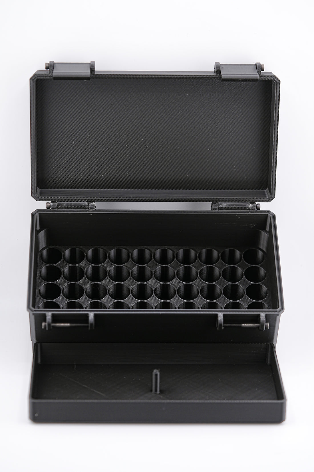 Black open vial case with compartments on a white background
