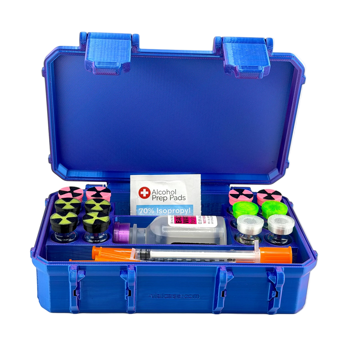 Open blue hard case holding small glass vials, a 30 mL bottle, a syringe, and alcohol prep pads.