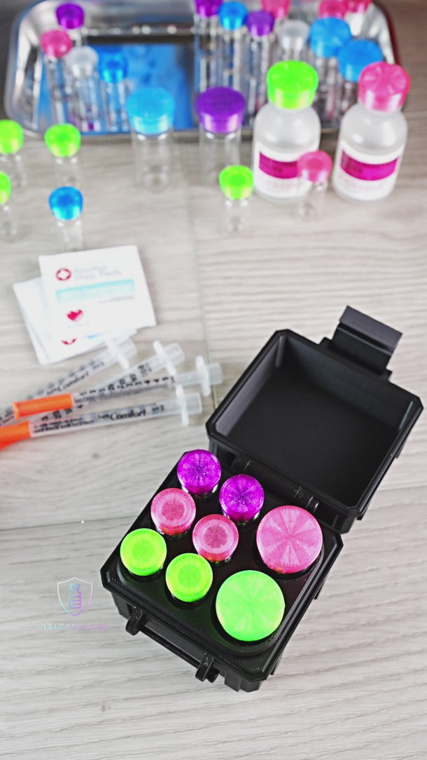 Black hard-shell storage case displaying four organized 10mL vials with additional supply storage compartment in a compact structured layout.