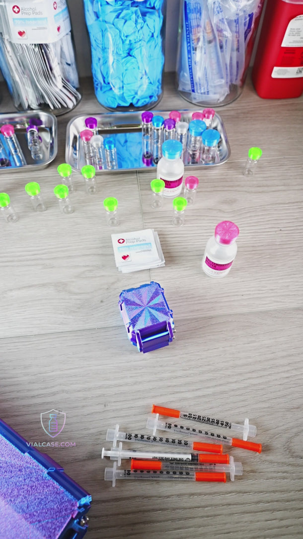 Compact hard-shell storage case holding three organized 3mL vials with separate compartment space for pads and supplies.
