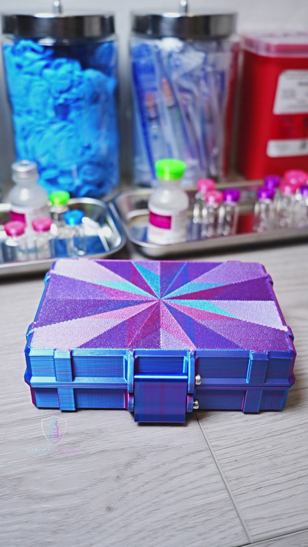 Small hard-shell storage case opened to reveal tightly organized rows of 3mL vials packed into a compact high-capacity layout inside a freezer-ready case.